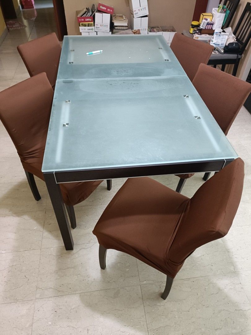 Dining table (Category: Tables & Sets) located in Singapore. Submitted by emiri22 (Listing ID 1324786165, Image 1). Description: Tempered glass top table, length can be extended by another ~47cm Must Collect BY 13 SEPT 2024 (Friday) at Hazel Park Condominium Please arrange own transport and delivery..