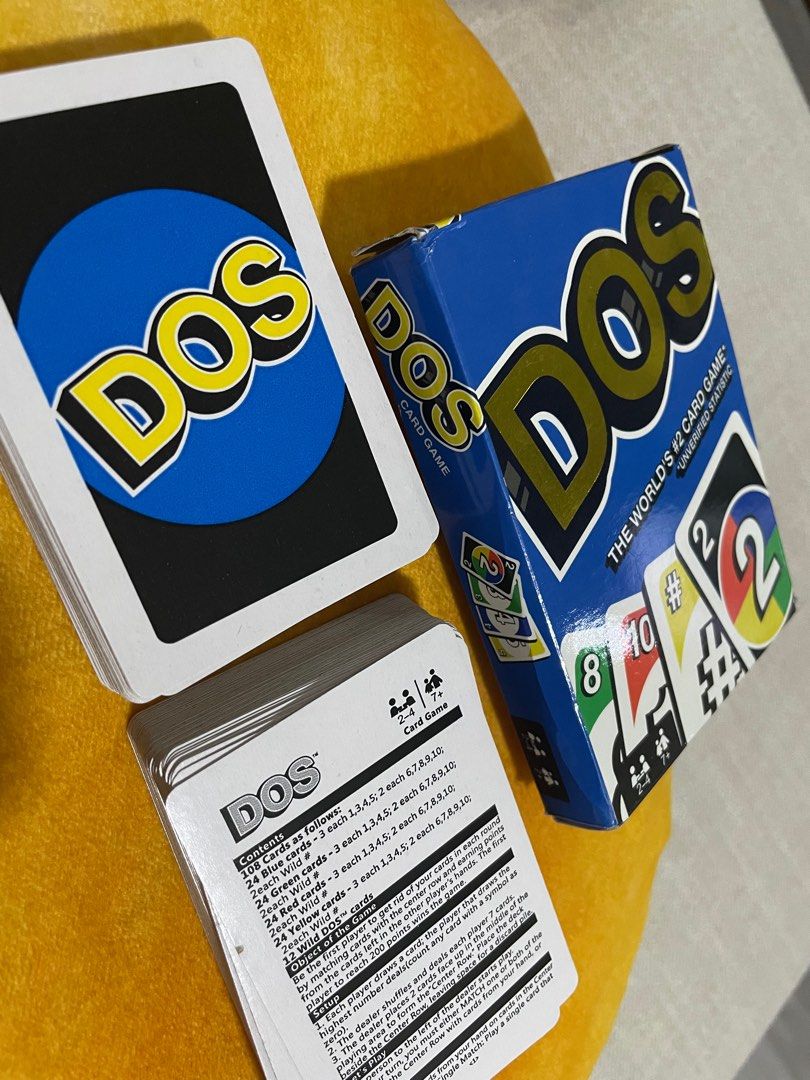 DOS card game (Category: Board Games & Puzzles) located in Quezon City. Submitted by kaylas__ (Listing ID 1324872623, Image 3). Description: Unlike UNO®, in DOS™ you primarily match numbers, but if you match colors as well you get a bonus! While in UNO®, you have one discard pile, in DOS™ you have at least two discard piles – sometimes more! And when you’re down to TWO cards, don’t forget to yell, “DOS!” Used but not abused Bought less than a yea
