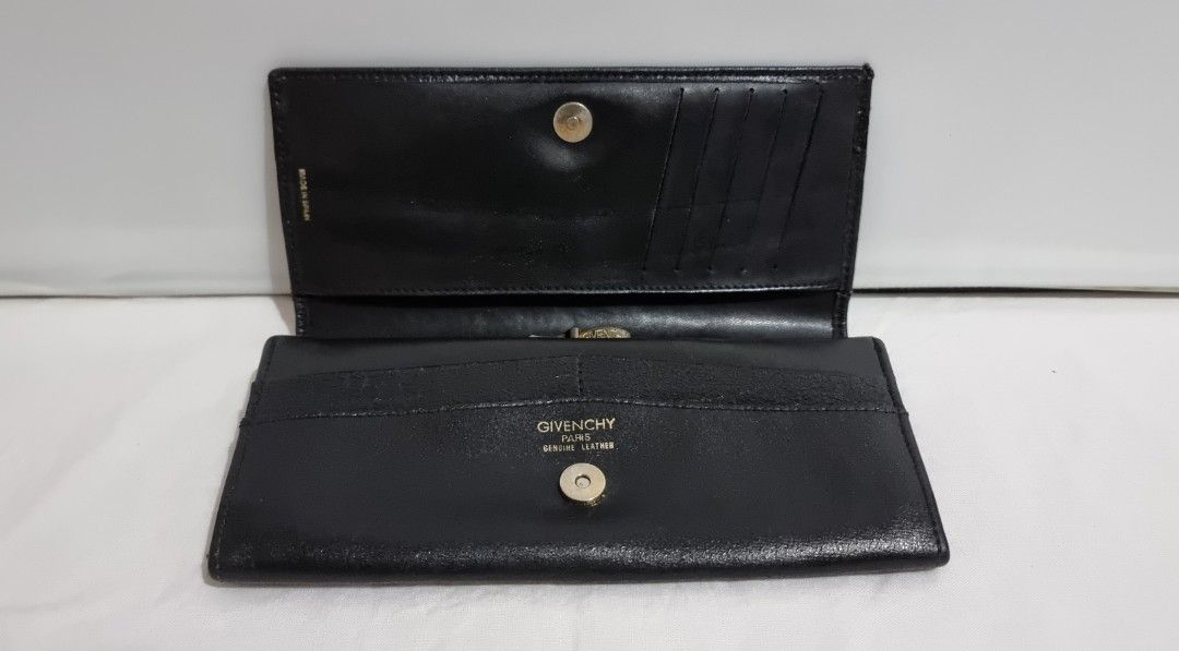 Givenchy Bifold Wallet (Category: Luxury Bags & Wallets) located in Binangonan. Submitted by c_r_i_s (Listing ID 1324877215, Image 3). Description: Givenchy Bifold Wallet Authentic Dimensions: Vintage With signs of use, scuffs, scratches, and creases With slight tear (2) on the card slot. Pls refer to the 9th picture Made in Spain.