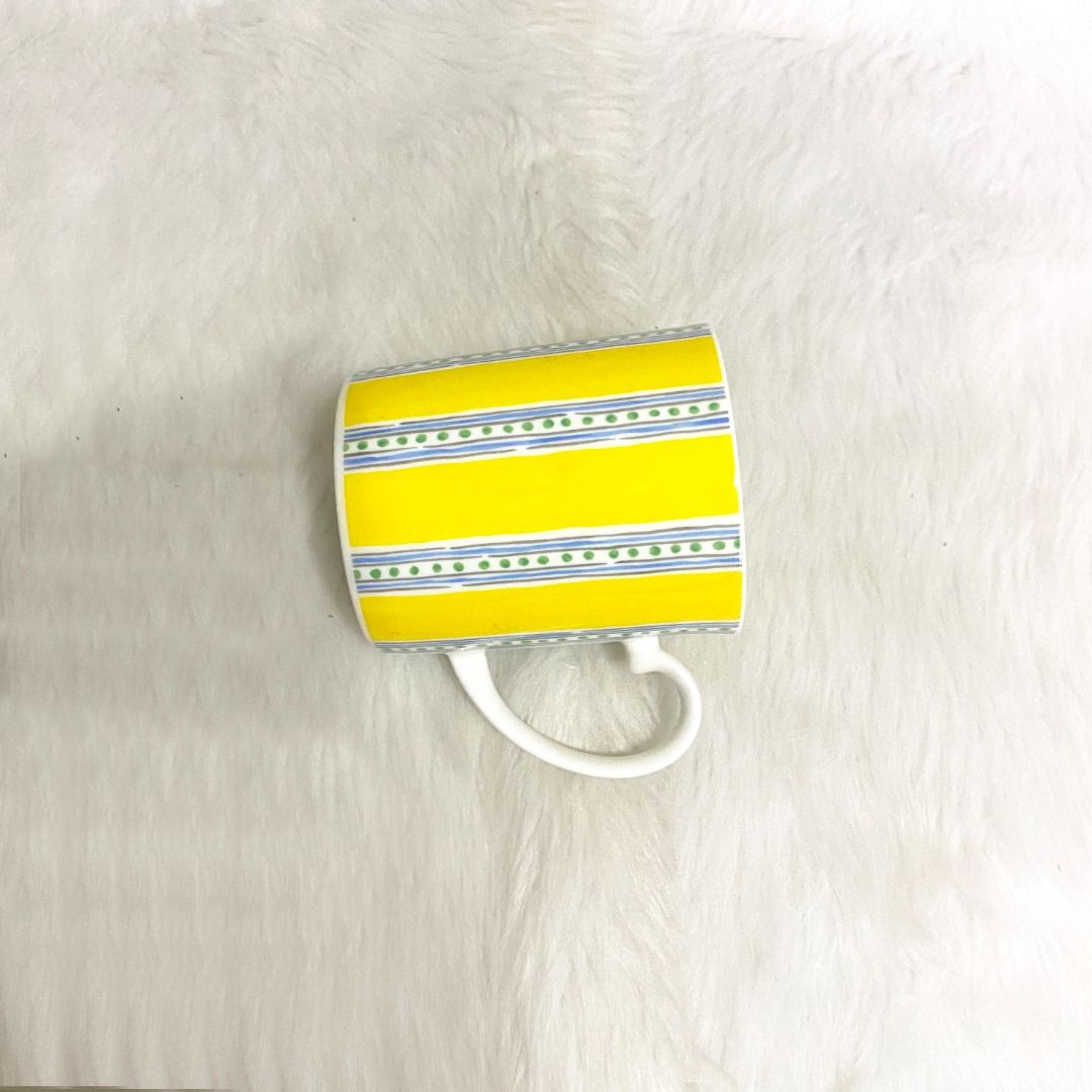Givenchy Yellow Striped Mug (Category: Coffee & Tea Tableware) located in Consolacion. Submitted by posh_avenue_home (Listing ID 1324866755, Image 3). Description: In very good condition. From Japan. 3.5" x 3". 100% authentic!!!.