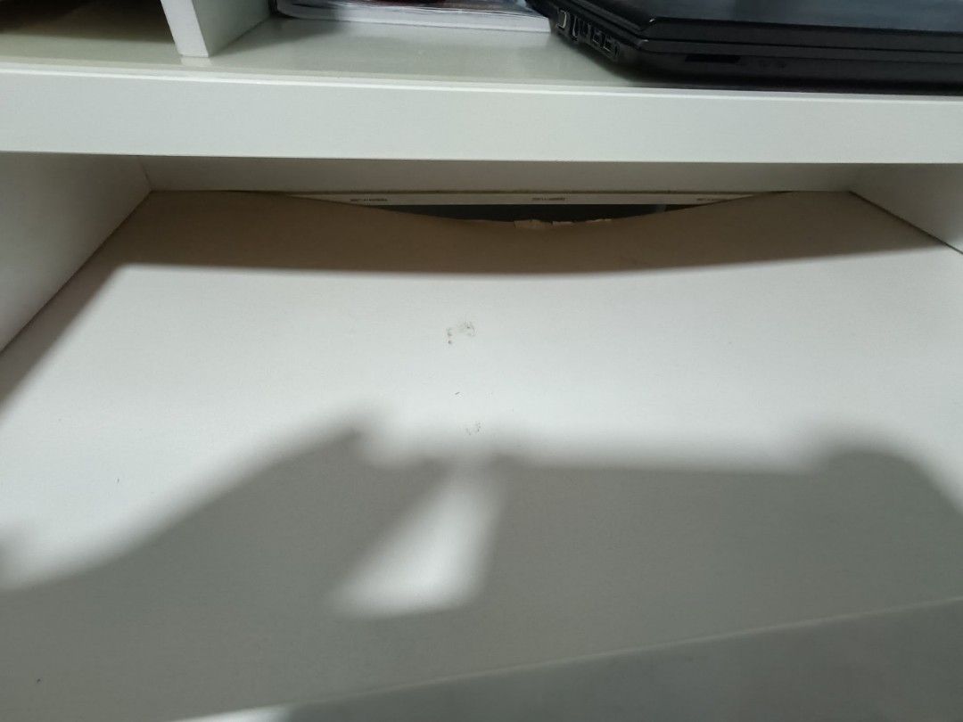 Ikea computer table (Category: Tables & Sets) located in Singapore. Submitted by kenmer929215 (Listing ID 1324870421, Image 2). Description: well used, table top is fine. one drawer has defect..