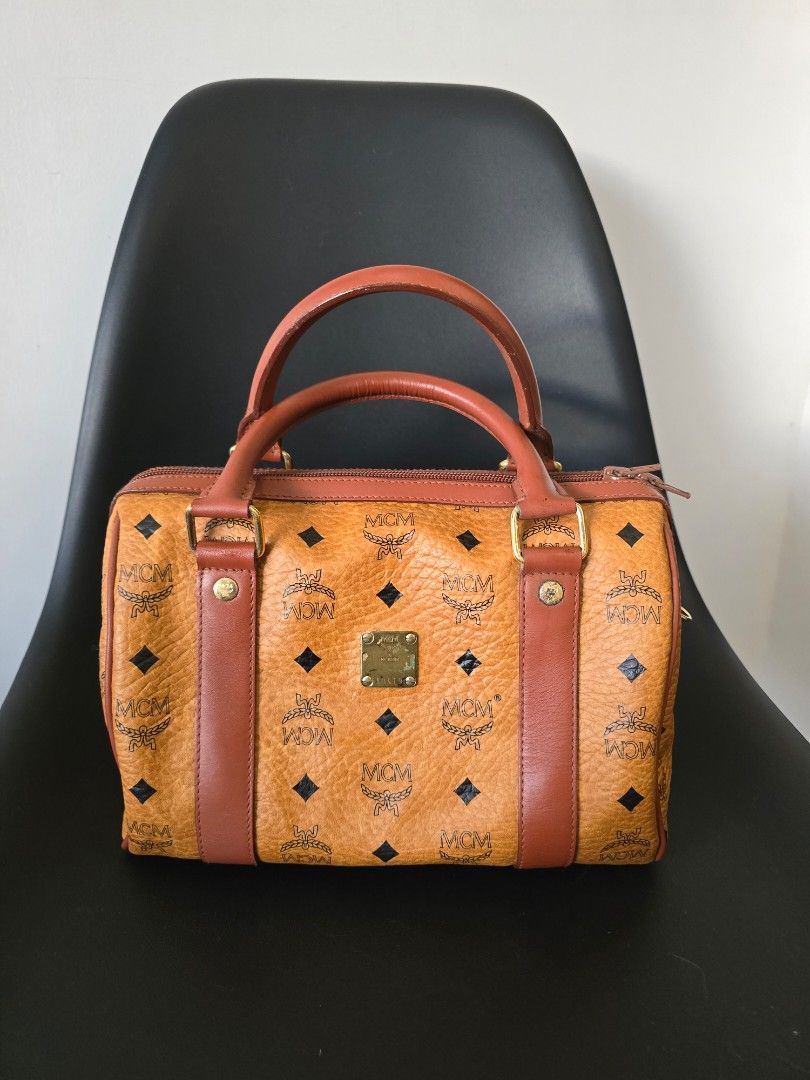 MCM Cognac Visetos Small Boston Bag (Category: Luxury Bags & Wallets) located in Pasig City. Submitted by kimjayson (Listing ID 1324835475, Image 1). Description: ‼️Please read‼️ Will not entertain questions that are already posted here. All items are Authentic. I do not, and will never own/sell fake or replicas. -------------------------------- No issue. Really good condition Location pick up 📍Valle Verde 2 Pasig Meet up 📍SM Center Pasig 📍Tie