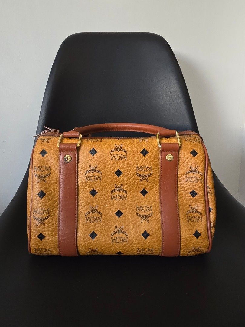 MCM Cognac Visetos Small Boston Bag (Category: Luxury Bags & Wallets) located in Pasig City. Submitted by kimjayson (Listing ID 1324835475, Image 3). Description: ‼️Please read‼️ Will not entertain questions that are already posted here. All items are Authentic. I do not, and will never own/sell fake or replicas. -------------------------------- No issue. Really good condition Location pick up 📍Valle Verde 2 Pasig Meet up 📍SM Center Pasig 📍Tie