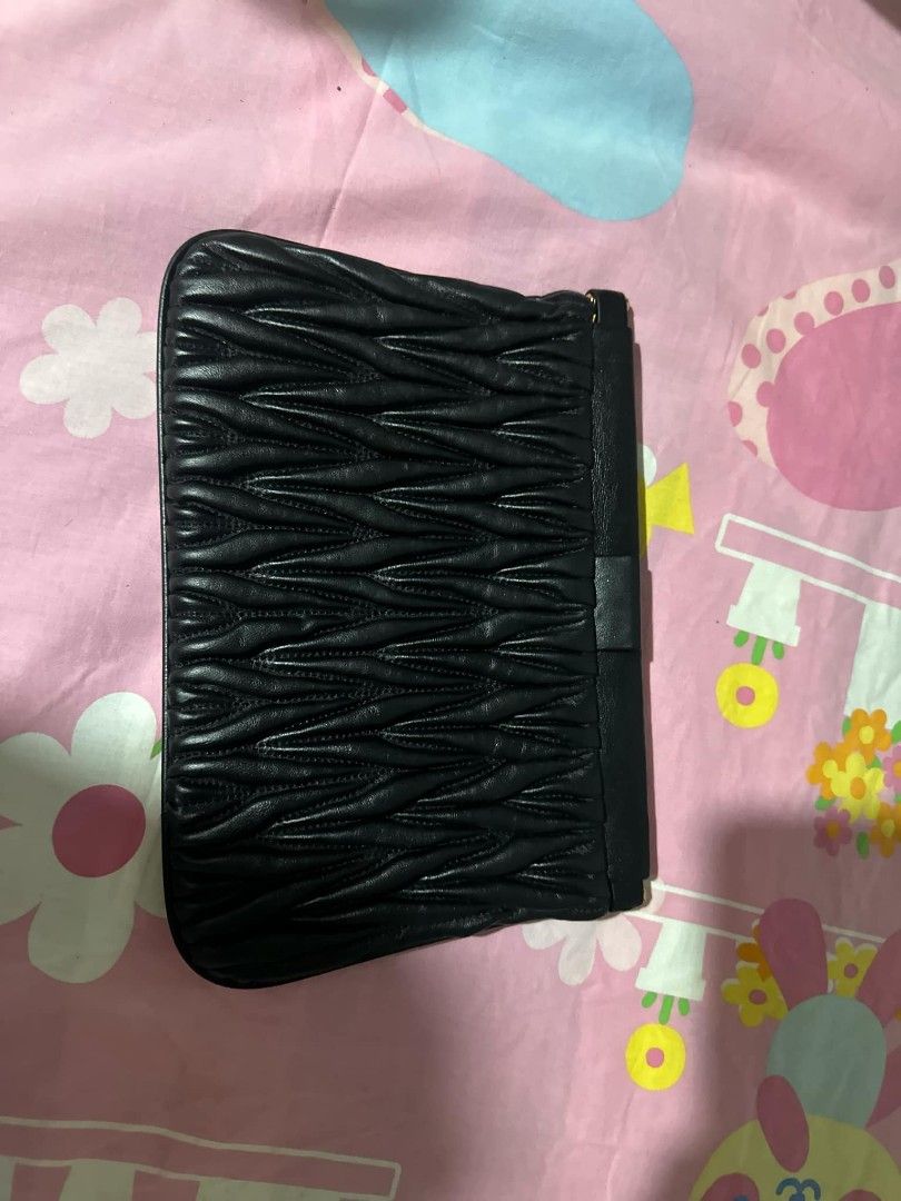Miu Miu clutch bag (Category: Luxury Bags & Wallets) located in San Jose. Submitted by cheapest_thrill_closet (Listing ID 1324865262, Image 3). Description: .