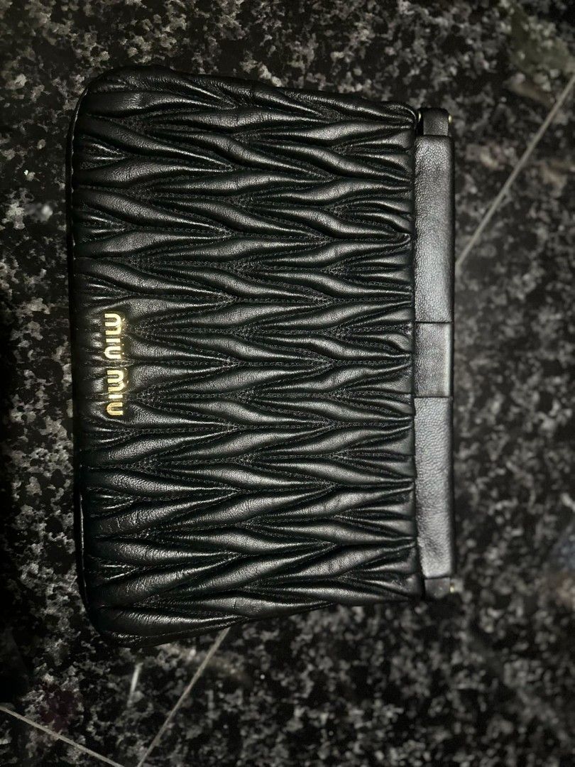 Miu Miu clutch bag (Category: Luxury Bags & Wallets) located in San Jose. Submitted by cheapest_thrill_closet (Listing ID 1324865262, Image 2). Description: .