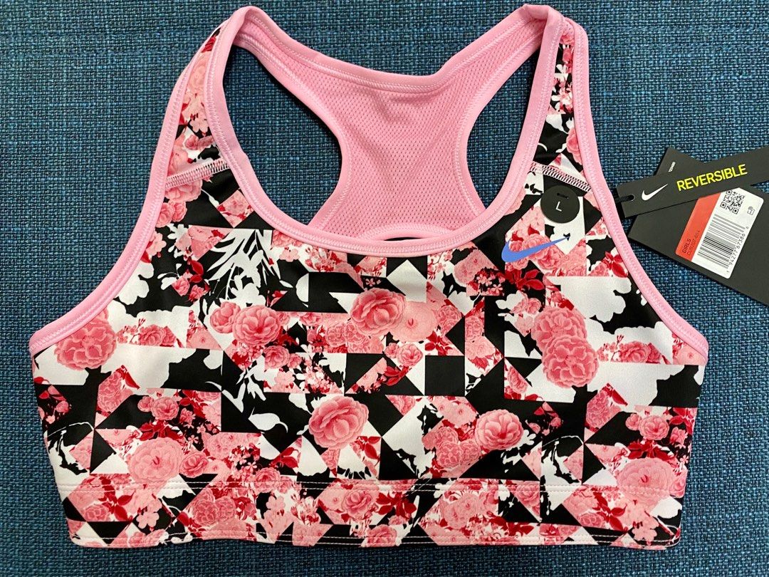 NIKE Reversible Sports Bra (Category: Activewear) located in Quezon City. Submitted by biancaadj (Listing ID 1324790223, Image 1). Description: Nike Reversible Sports Bra -Original -Brand New w/ tag -Reversible -Large on tag (usually for 12-13yo girls but can fit petite women 75 cm) -Kindly see tag on photos for additional info on sizing -No pads RFS: Decluttering, never been used.