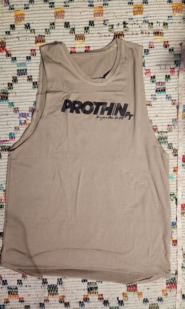 Nude muscle tee prothin (Category: Sleeveless) located in Makati City. Submitted by beabbbea (Listing ID 1324802353, Image 1). Description: free for if you purchase any item from me worth at least 100 php (1 free item per 100 php purchase).