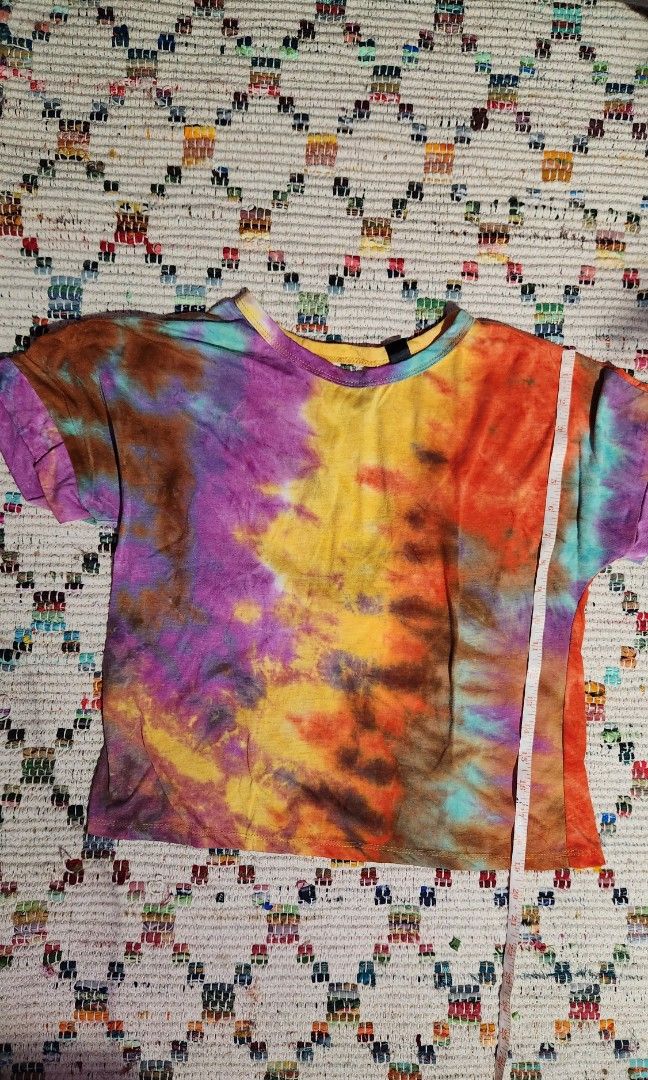 Tye die shirt with twist back (Category: Shirts) located in Makati City. Submitted by beabbbea (Listing ID 1324802518, Image 1). Description: fits until medium shipping via lalamove/grab or lbc.