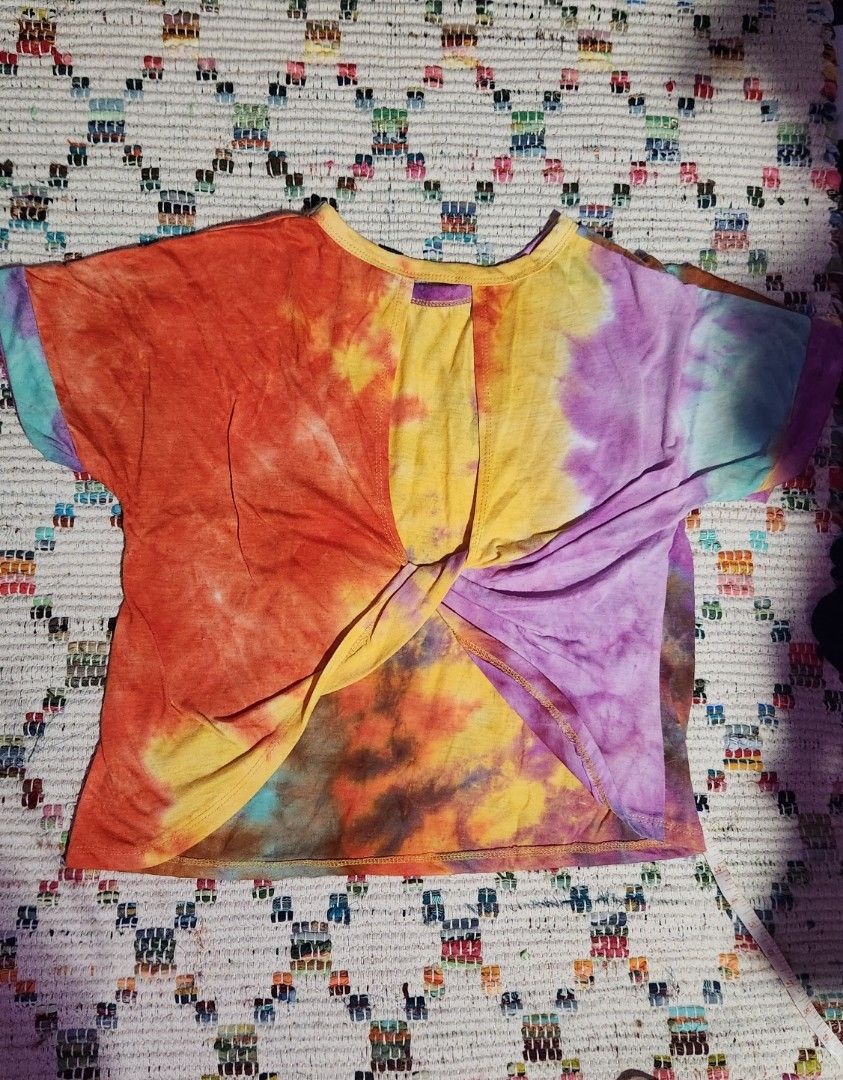 Tye die shirt with twist back (Category: Shirts) located in Makati City. Submitted by beabbbea (Listing ID 1324802518, Image 2). Description: fits until medium shipping via lalamove/grab or lbc.