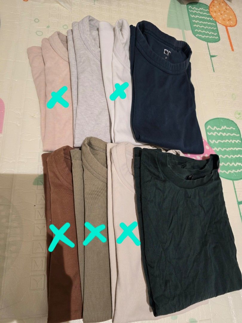 Uniqlo Shirts (Category: Shirts) located in Manila. Submitted by live.hellokeffir (Listing ID 1324684318, Image 1). Description: Take all for P1,000.