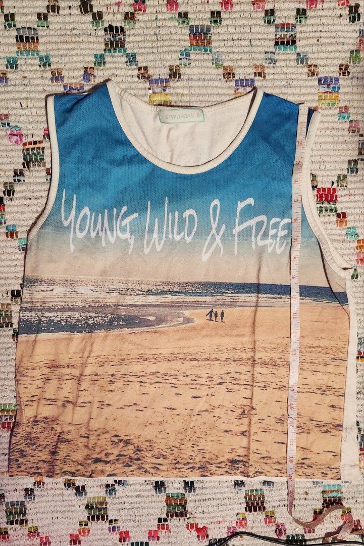 Young wild and free top (Category: Sleeveless) located in Makati City. Submitted by beabbbea (Listing ID 1324802630, Image 1). Description: free for if you purchase any item from me worth at least 100 php (1 free item per 100 php purchase).