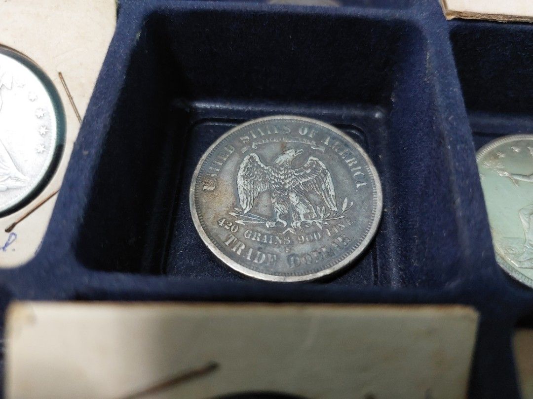 1876 Silver Trade Dollar (Category: Currency) located in Quezon City. Submitted by ejo23 (Listing ID 1325066906, Image 2). Description: An 1876-S Silver US Trade Dollar. Circulated but in relatively good condition. Was originally packaged in a PVC coin holder like many old coins leading to the green tint. Around 2017 it was then removed from the PVC holder and cleaned with an acetone bath. Has never been polished and has never been cleaned with a