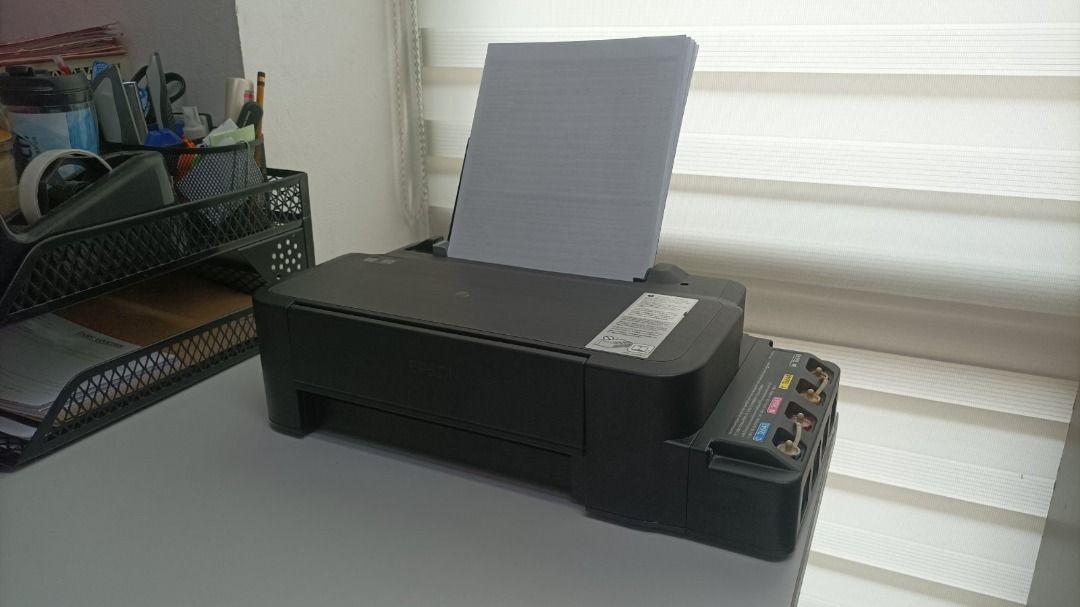 Epson L121 (Category: Printers, Scanners & Copiers) located in Quezon City. Submitted by maryjoy_gentech (Listing ID 1325009786, Image 1). Description: Print speed of up to 9.0 ipm (black) and 4.8 ipm (colour) Ultra-high page yield of 4,500 pages (black) and 7,500 pages (colour) 2-year warranty or 20,000 pages, whichever comes first Powered by Epson Heat-Free Technology.