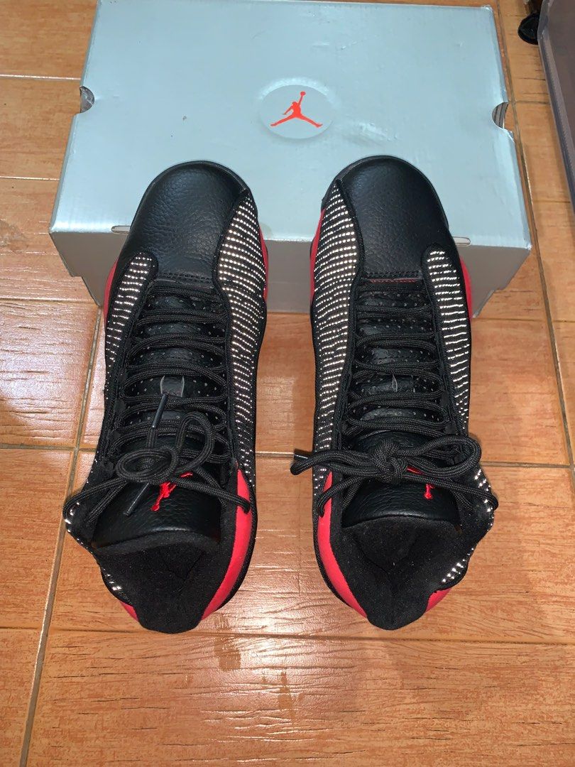 Nike Air Jordan 13 BlackRed (Category: Sneakers) located in Baguio. Submitted by okidoki_24 (Listing ID 1325053183, Image 1). Description: Nike Air Jordan 13 BRED, lightly used like new.