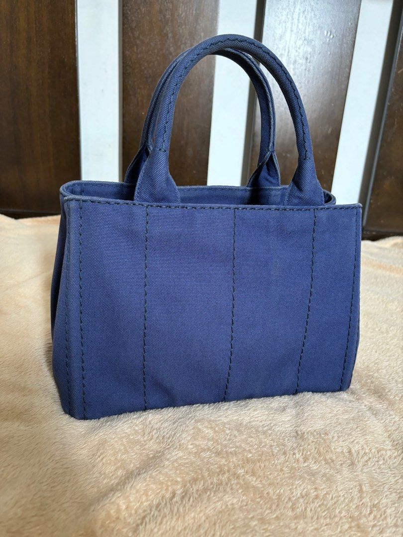 Prada Canapa Bluette (Category: Luxury Bags & Wallets) located in Bacoor. Submitted by mc_shopper (Listing ID 1324936773, Image 2). Description: Preloved good condition Comes with authenticity card and dust bag.