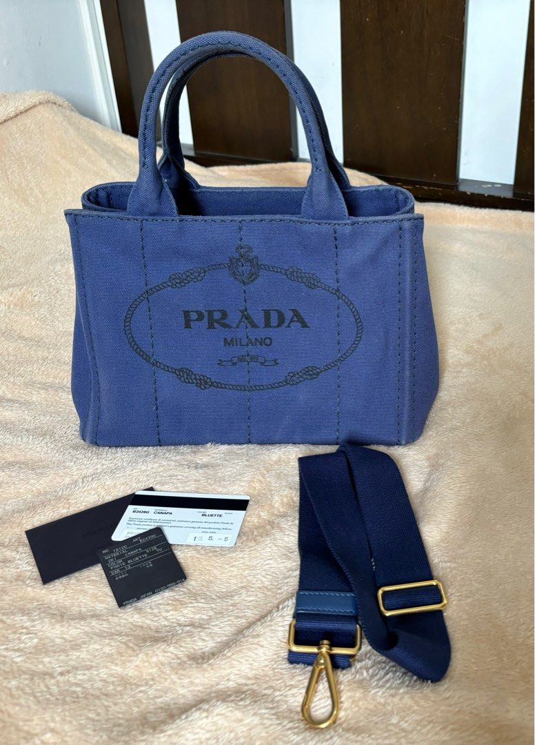 Prada Canapa Bluette (Category: Luxury Bags & Wallets) located in Bacoor. Submitted by mc_shopper (Listing ID 1324936773, Image 1). Description: Preloved good condition Comes with authenticity card and dust bag.