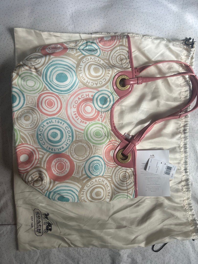 Authentic Coach Shoulder Bag - Brand New (Category: Luxury Bags & Wallets) located in Malabon City. Submitted by lesthriftmnl (Listing ID 1325165700, Image 1). Description: Authentic Coach Multicolor The Beach Print F19184 Tote Bag Pink (Brand New) 100% Legit Imported from US With Original Dust Bag With Original Tags What you see is what you get. Since the pouch does not include any protective cover for the pouch. We will pack in the most care po