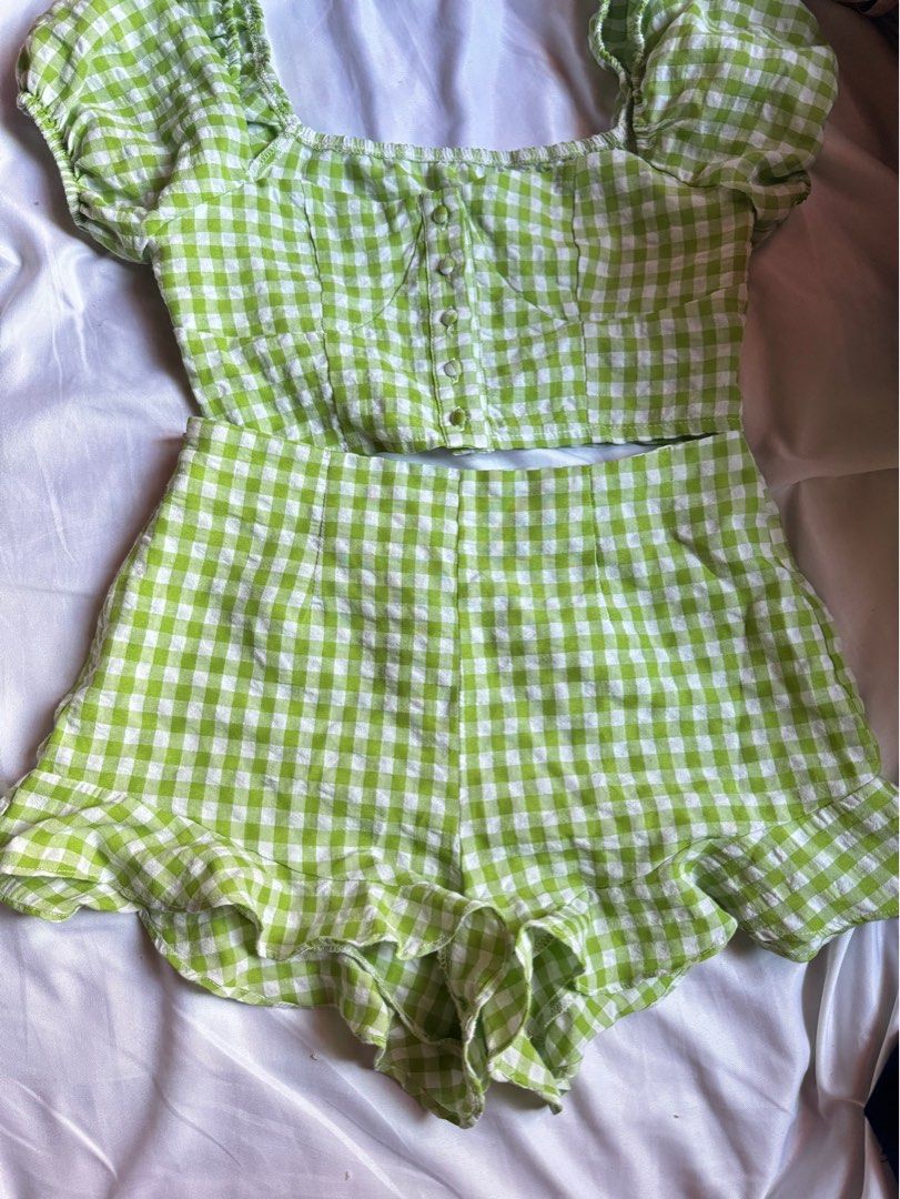Gingham puff sleeve top & ruffle hem shorts set (Category: Sets or Coordinates) located in Paranaque City. Submitted by maedizon (Listing ID 1325239417, Image 3). Description: Green gingham puff sleeve top & ruffle hem shorts set Like new Nastore lang sa closet for a long time .