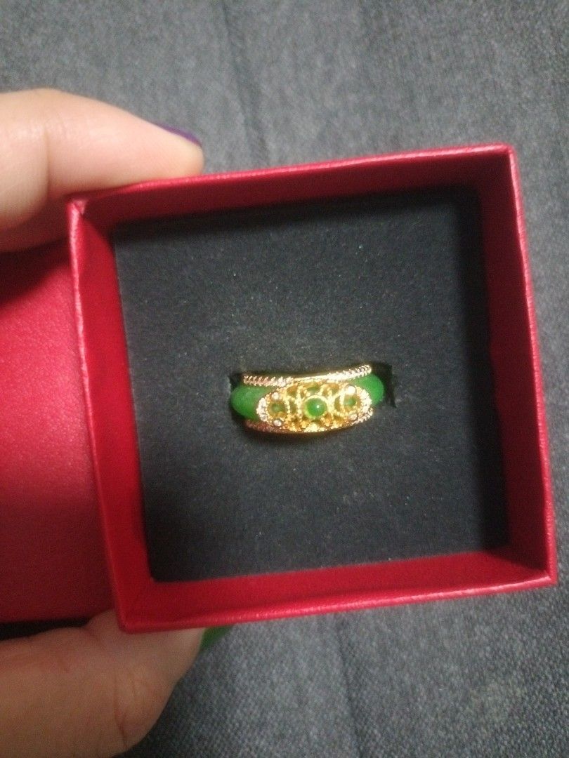 Jade statement ring (Category: Rings) located in Singapore. Submitted by otakuworld (Listing ID 1325226562, Image 1). Description: Jade is not real, it is highly probable resin. It looks very nice as a cosplay ring or statement ring in general. Gold color is not tarnished. Jade can be removed from the gold ring..