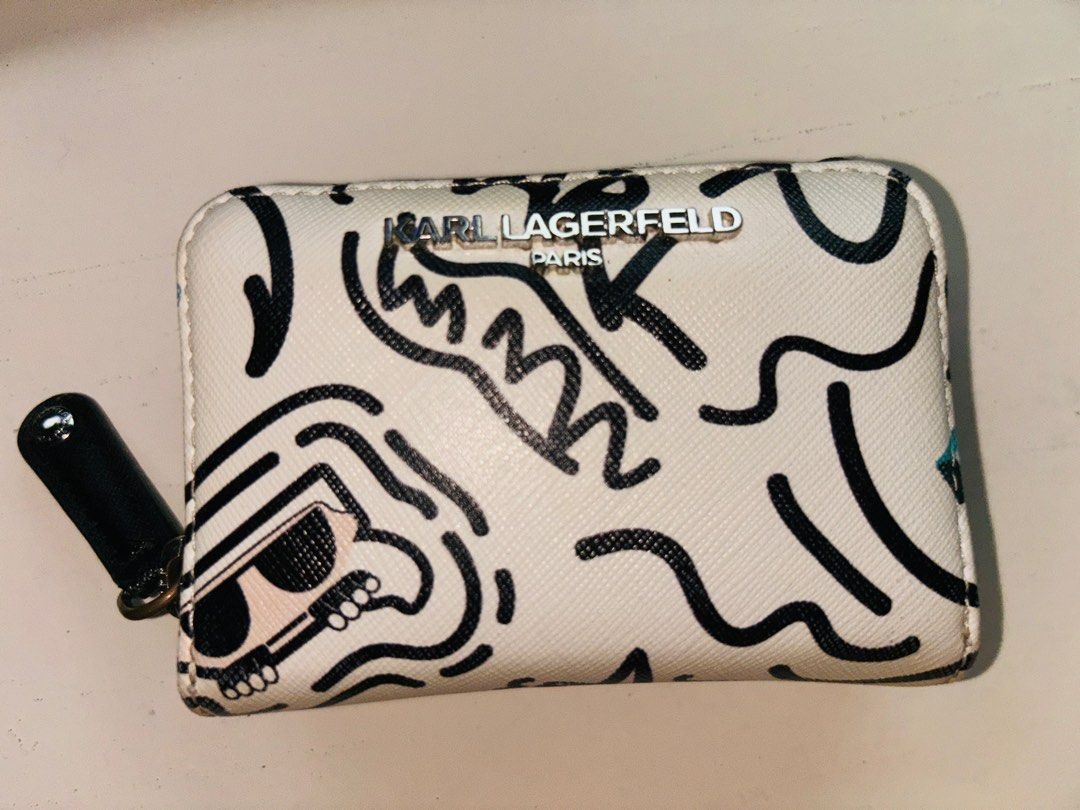 Karl Lagerfeld small wallet (Category: Wallets & Card holders) located in Bulacan. Submitted by tamiyaaa (Listing ID 1325242325, Image 1). Description: 11 card slots Faded color hardware (see photo 4) Bought for 3k Rfs: decluttering/too many wallets.