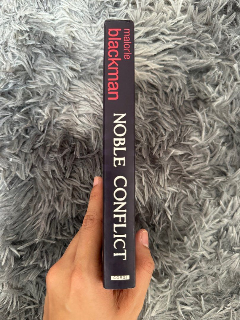 Noble Conflict by Malorie Blackman (Category: Storybooks) located in Paranaque City. Submitted by redreads (Listing ID 1325176565, Image 2). Description: 📚Noble Conflict by Malorie Blackman ➡️ paperback size. pre-loved book in good condition. no annotations, no highlights. however, tanning is visible. book is authentic, not reprint. rfs: decluttering, need shelf space for new books; some are duplicate copies ✅FREE FULLY BOOKED CARD VOUCHER (clai