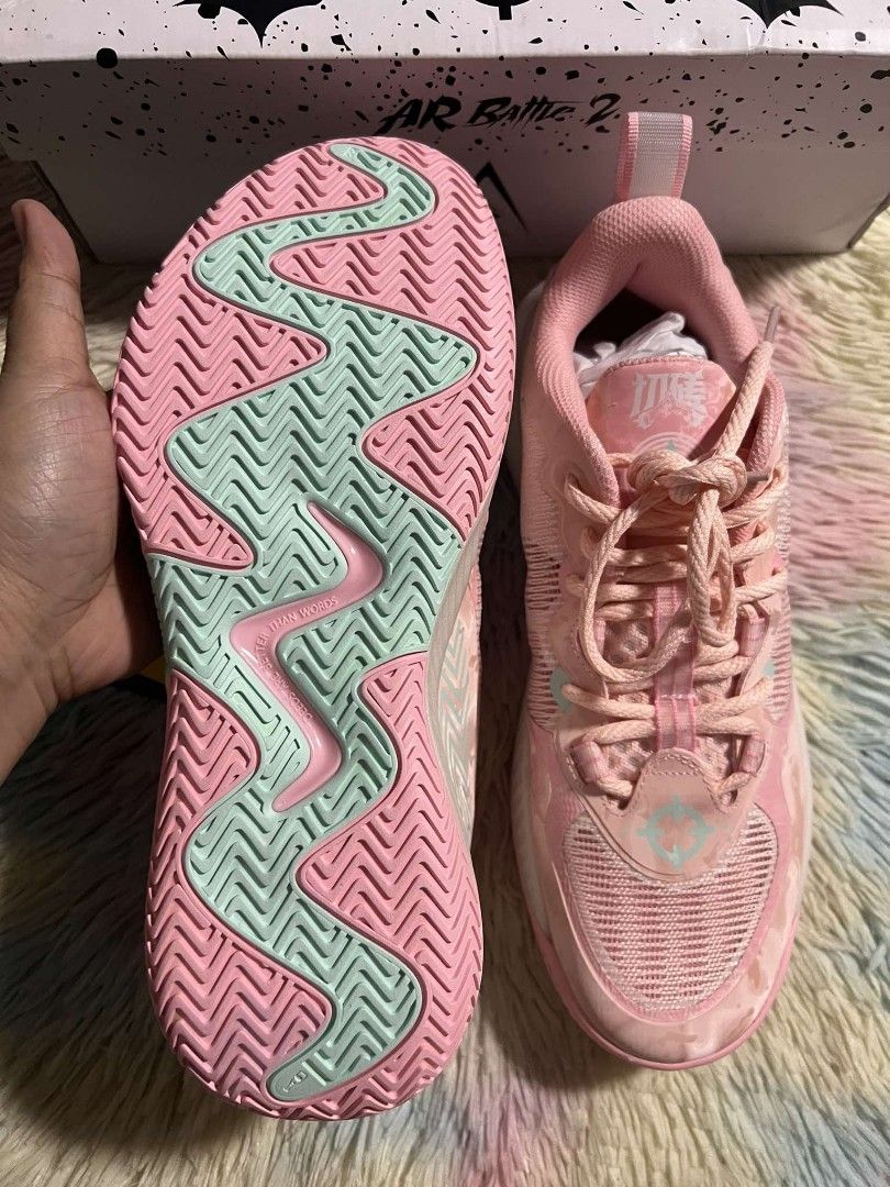 Pink basketball shoes meaning best sale