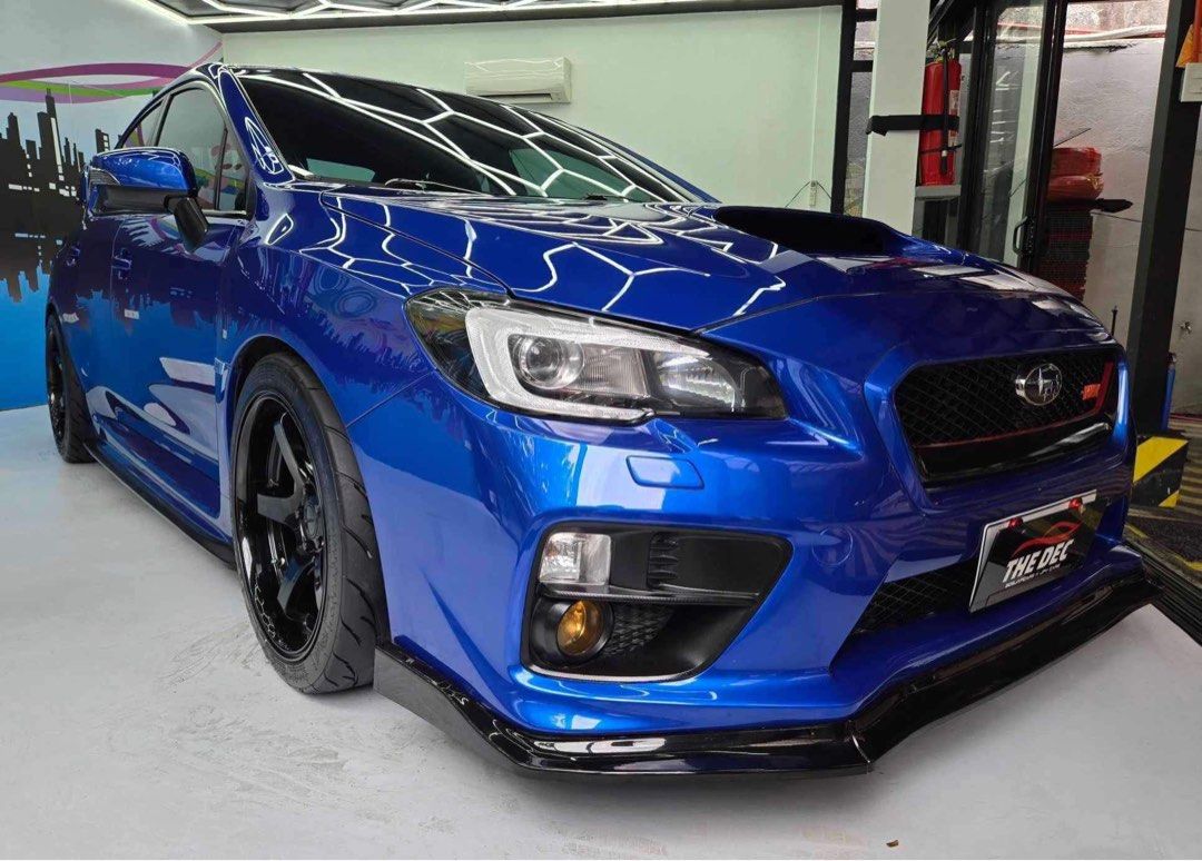 Subaru WRX AT Auto (Category: Used Cars) located in Manila. Submitted by quality_cars (Listing ID 1325184991, Image 3). Description: FOR SALE - Guaranteed Best Buy! ✅ Brand: Subaru Model: WRX Year Model: 2015 Model Transmission: Automatic Color: Blue Fuel Type: Gas Engine Mileage: 43K Mileage Ending Plate: "9" Friday Coding MY SELLING PRICE: 1.010M Trade In Ok, Financing Ok 18in Orig Rota Mags STi Look Wrap Around Body Kits Quad Exhaust STi Wing 