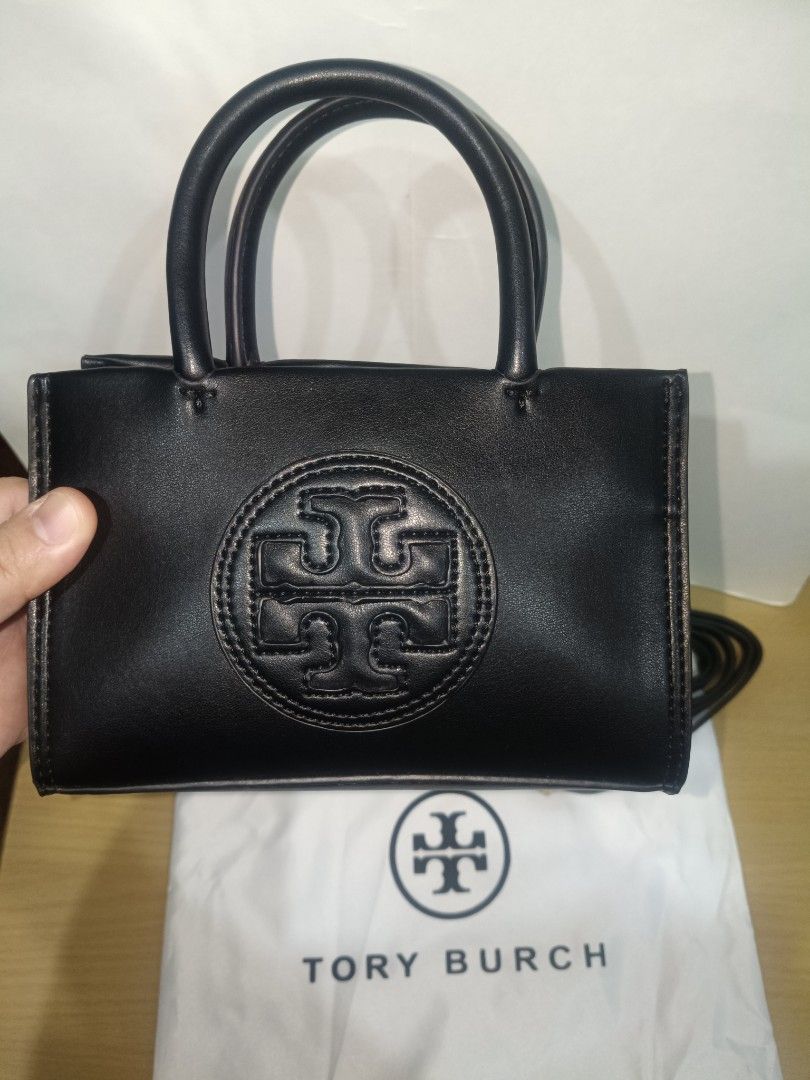 T0r¥ BüR€H Ella Bio Mini Tote (Category: Luxury Bags & Wallets) located in Noveleta. Submitted by simplegirl3 (Listing ID 1325114752, Image 2). Description: T0r¥ BüR€H Ella Bio Mini Tote (Authentic Quality - meaning ALMOST EXACTLY LIKE THE ORIGINAL) Price: 3,099 RFS: bought online but won't be using Includes: Dust bag and Strap only Bag Condition: Almost New, no visible signs of usage Strap Condition: Almost New, no visible signs of usage except 