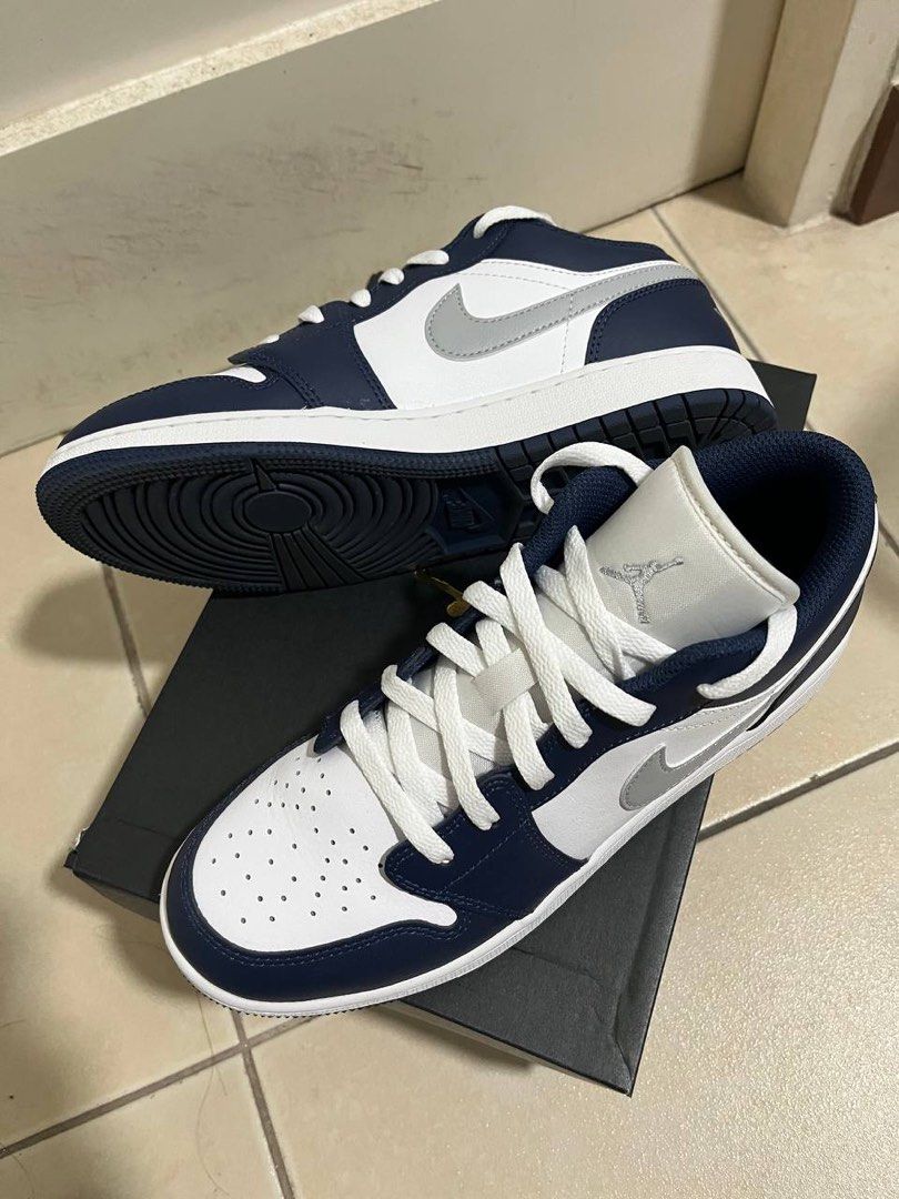 Air Jordan 1 Low (Category: Sneakers) located in Bulacan. Submitted by avenade (Listing ID 1325382156, Image 2). Description: Air Jordan 1 Low White/Midnight Navy/ Wolf Grey Size US 7Y Older Kids’ Shoes pero pwede sa matanda size 7 mens US 3x lang nasuot See last pic for order details.