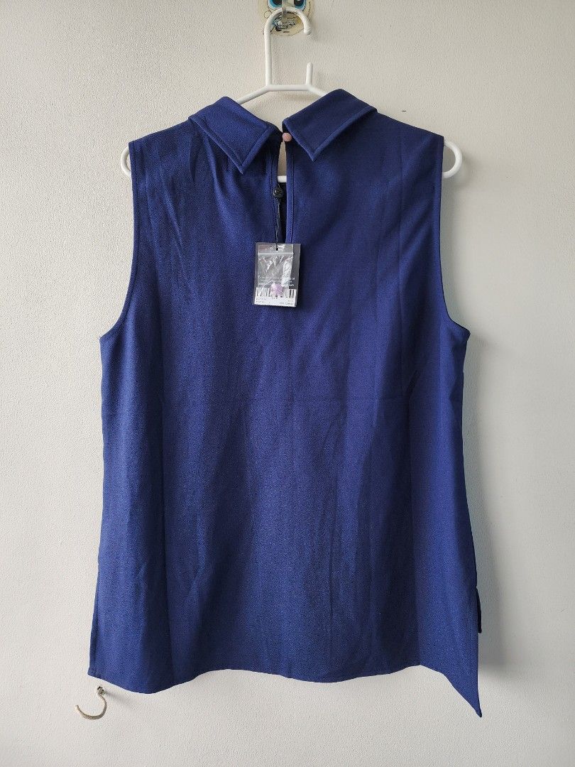 BNew Plains and Prints Sleeveless Top (Category: Blouses) located in Manila. Submitted by jenkto (Listing ID 1325330053, Image 2). Description: Brand new with tag at 1299. Gifted but just kept. Size L..