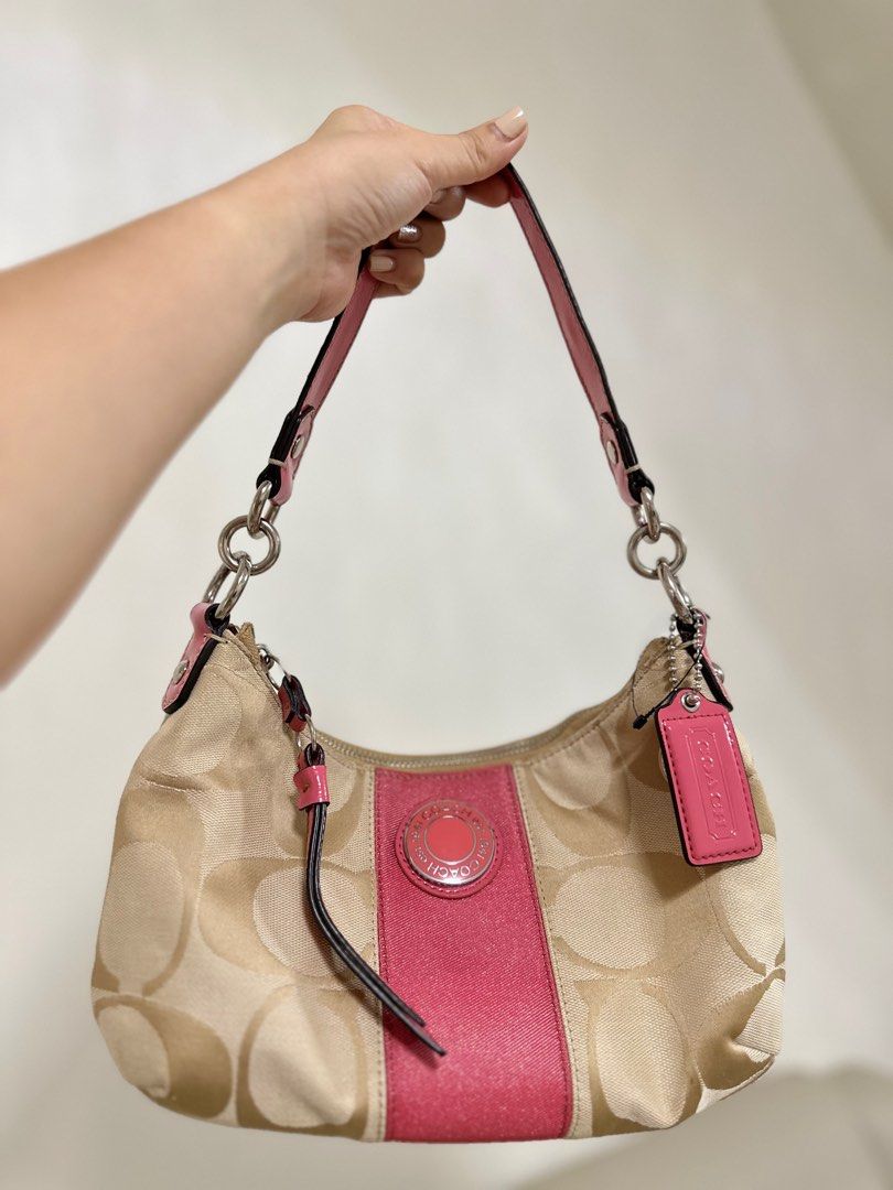 Coach 2-way sling bag (Category: Luxury Bags & Wallets) located in Dumaguete. Submitted by paolaslane (Listing ID 1325348052, Image 1). Description: Original Coach 2way sling nag Like new condition Clean inside and out.