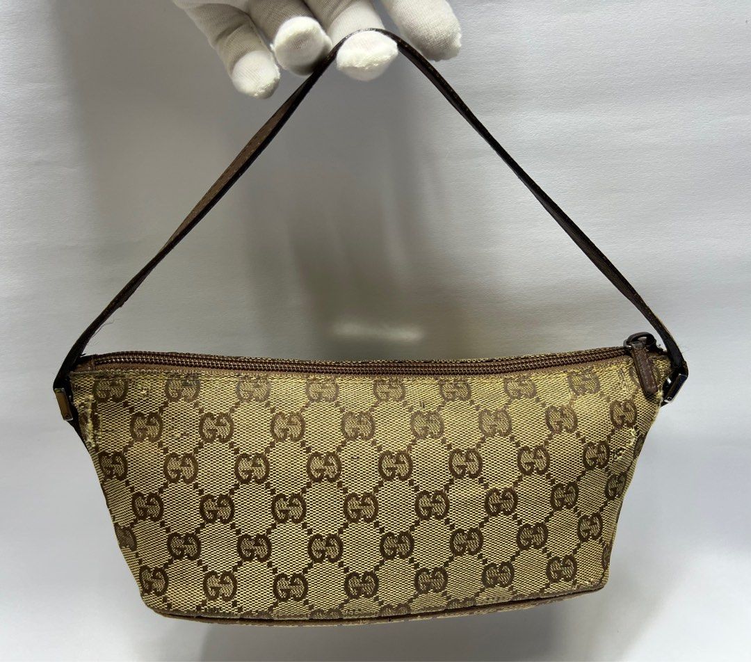 Gucci hand pouch outlet