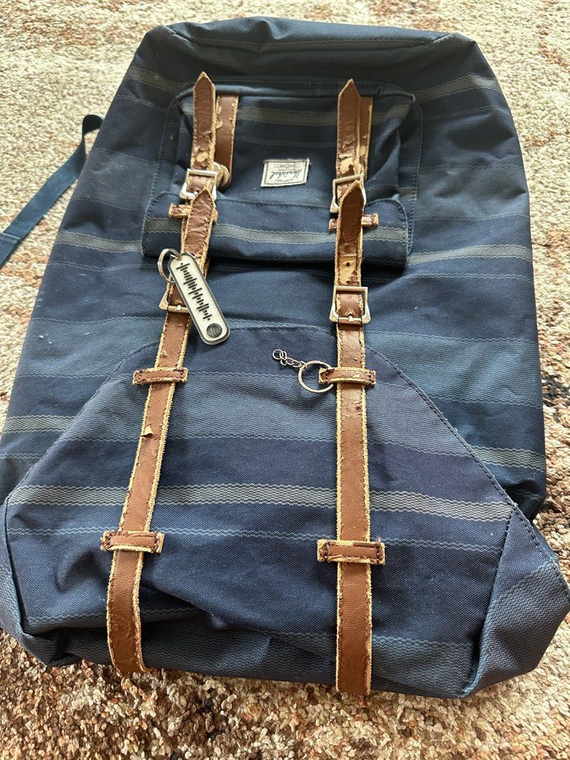 HERSHEL LARGE ORIGINAL BACKPACK (BLUE) (Category: Backpacks) located in Mandaluyong City. Submitted by advikgaba (Listing ID 1325313542, Image 1). Description: - **Brand**: Herschel 🎒 - **Model**: XL-sized backpack, ideal for everyday use or travel 🚶‍♂️🛤️ - **Original Price**: ₹8,000 💸 - **Selling Price**: **₹1,550** (great deal!) 🏷️ - **Condition**: Pre-owned with some signs of wear, but still **functional and stylish** 👌 - **Exterior**: D
