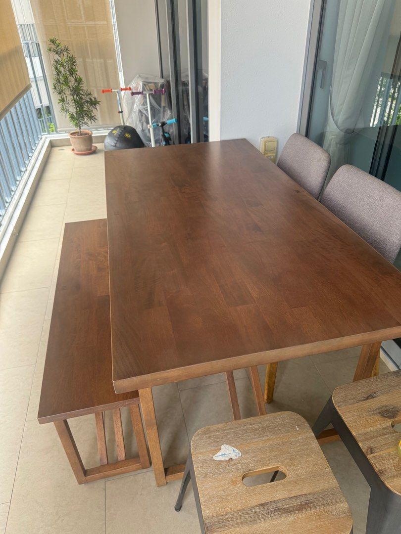 Solid Wood Dining Table (Category: Tables & Sets) located in Singapore. Submitted by ndeewong (Listing ID 1325320733, Image 3). Description: Looking to clear my balcony dining table. good condition. well maintained. solid quality wood. .