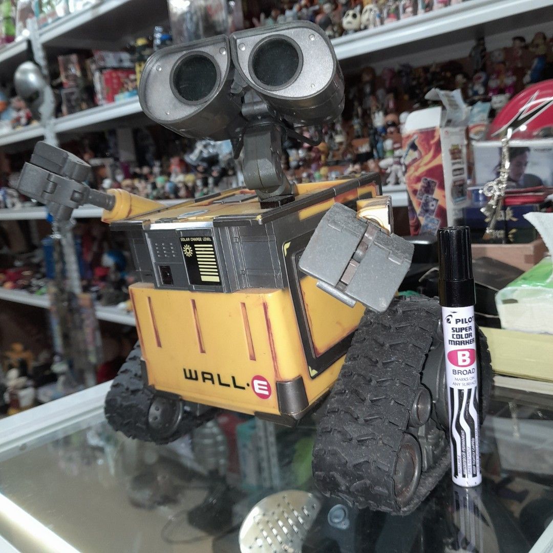 Wall E 10 inches (Category: Interactive Toys) located in Baguio. Submitted by shellcollector (Listing ID 1325320062, Image 2). Description: Wall E Toy Robot Big size 10 inches Working sounds, light up eyes Moving hands and head Moves and dance No box 4950 Pesos Baguio shipping.