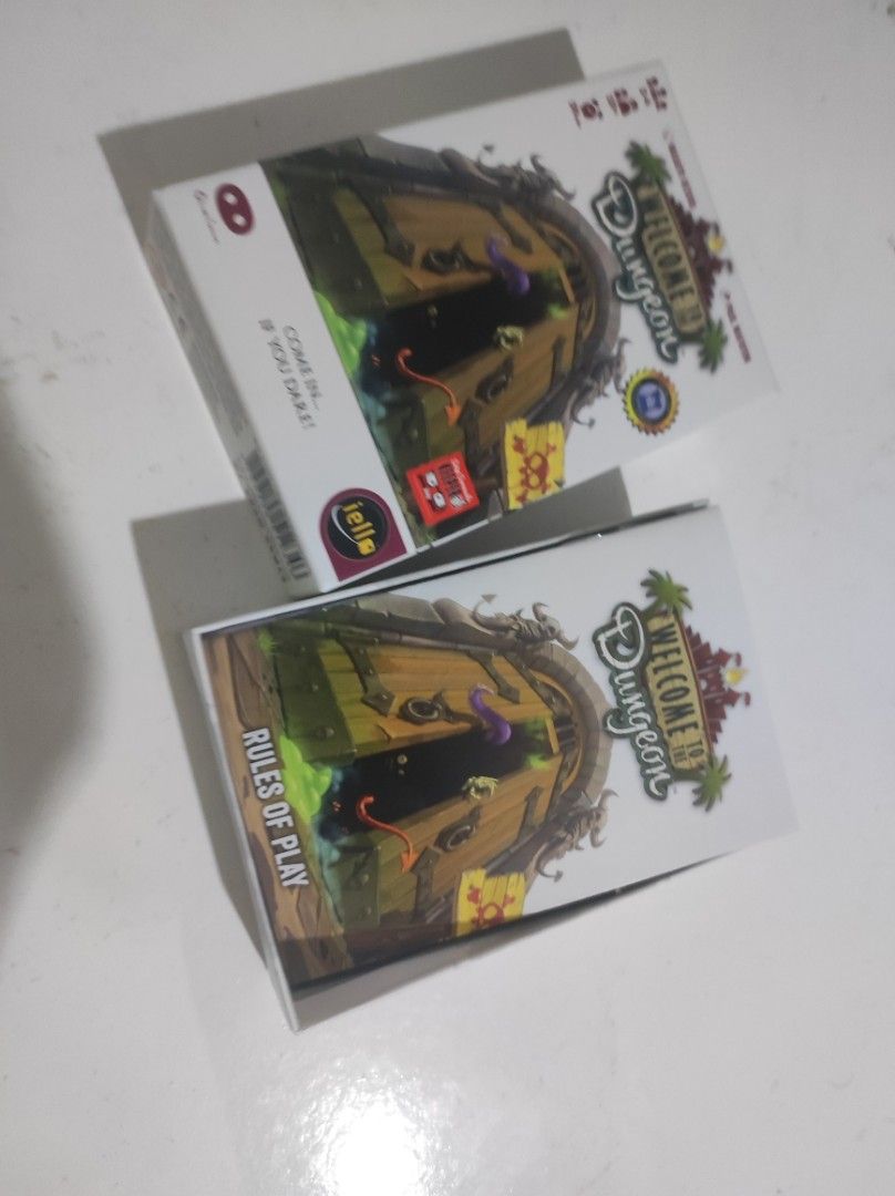 Welcome to the Dungeon Board Game (Category: Board Games & Puzzles) located in Makati City. Submitted by ivprz (Listing ID 1325320635, Image 2). Description: Bought this a while back and enjoyed our plays but this isn't hitting the table much and I need to make room for new games! Great little push-your-luck and bluffing game. Everything is in great condition and all the cards are sleeved. -- Welcome to the Dungeon is a push-your-luck dungeon del