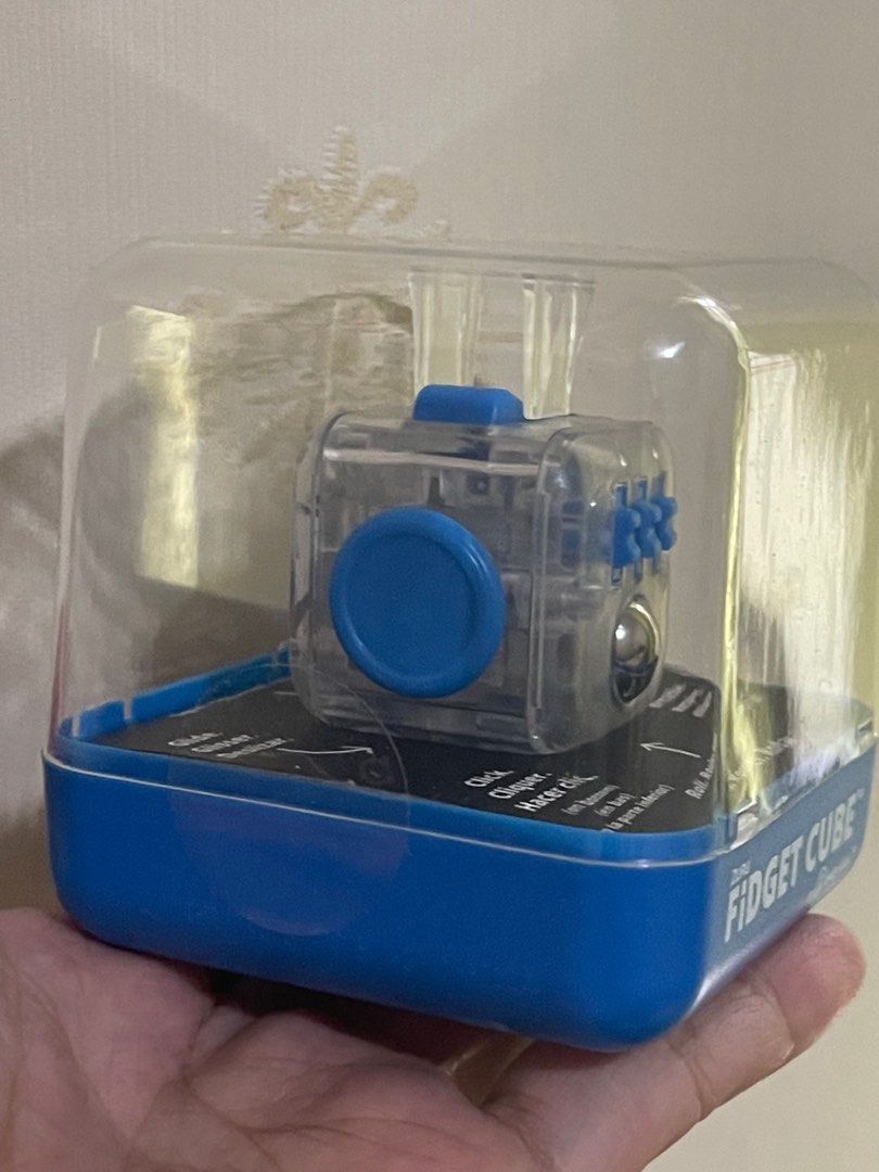 ANTSY LABS FIDGET CUBE ORIGINAL (Category: Designer & Blind Box Toys) located in Quezon City. Submitted by minion.craze (Listing ID 1325567897, Image 2). Description: ANTSY LABS USA FROM THE MAKERS OF THE ORIGINAL FIDGET CUBE 100% ORIGINAL TRANSPARENT w/ BLUE ALSO AVAILABLE: Glow in the dark Graphite Gray Midnight Black Teal LIMITED EDITION KICKSTARTER MIDNIGHT FRESH FOR ADULTS AND KIDS FREE THE FIDGET IN YOU SHIPPING VIA: LALAMOVE / GRAB LBC - C