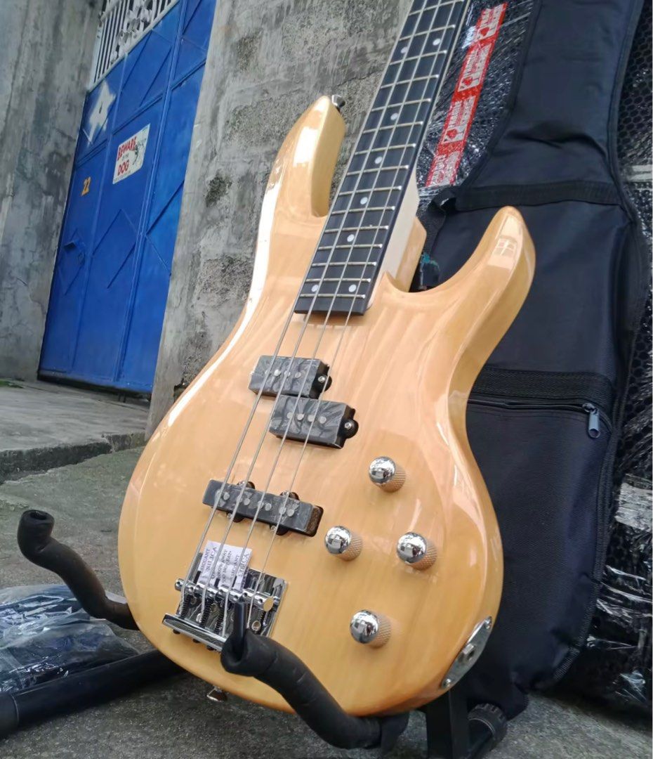 Bass Guitar - Passive 4 string bass (Category: Musical Instruments) located in Las Pinas. Submitted by wat3rm3lynn (Listing ID 1325586529, Image 1). Description: Bass Guitar - natural / cream color Passive 4-string bass Bought from Laz last year. Condition - almost new since barely used Includes unit, cord and free strap RFS: No time to use it and I had finger injury All conversations, let’s do it in Carousell please, not in any other online plat