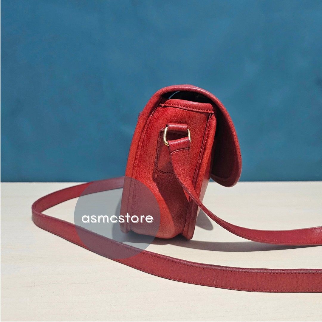 Coach Vintage Collegiate in Red (Category: Luxury Bags & Wallets) located in Marikina City. Submitted by asmcstore (Listing ID 1325582834, Image 3). Description: Coach Vintage Collegiate in Red Made in the United States Mid to late 70's **ROOSTER CHARM NOT INCLUDED** **These are VINTAGE/PRELOVED bags signs of usage might be present** **Bags are cleaned and conditioned**.