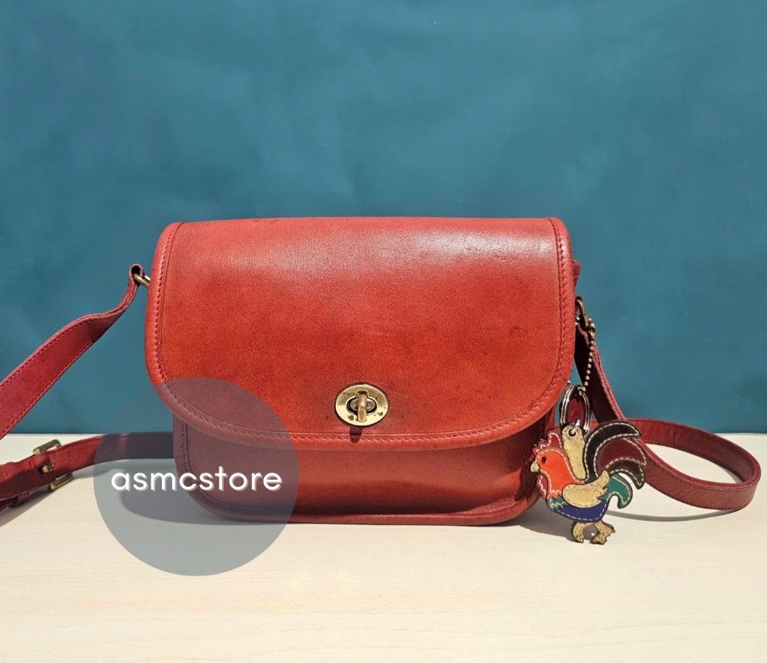 Coach Vintage Collegiate in Red (Category: Luxury Bags & Wallets) located in Marikina City. Submitted by asmcstore (Listing ID 1325582834, Image 1). Description: Coach Vintage Collegiate in Red Made in the United States Mid to late 70's **ROOSTER CHARM NOT INCLUDED** **These are VINTAGE/PRELOVED bags signs of usage might be present** **Bags are cleaned and conditioned**.