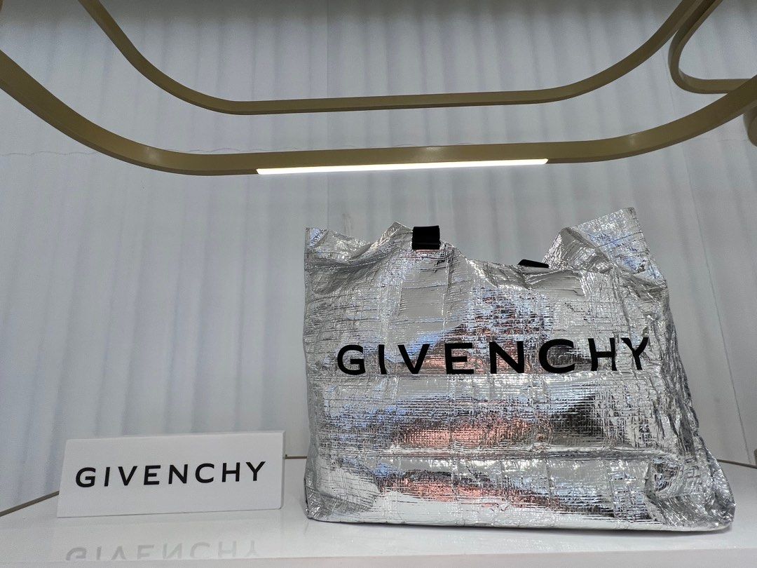 Givenchy G-Shopper Metallic Silver Logo Tote Bag (Category: Luxury Bags & Wallets) located in Makati City. Submitted by luxuryshopper01 (Listing ID 1325610516, Image 1). Description: Givenchy G-Shopper Metallic Silver Logo Tote Bag 100% Authentic and Brand New With Box, Dust Bag, Authenticity Card and Paper Bag (ideal for gift) Store Price: Php 62,500 .
