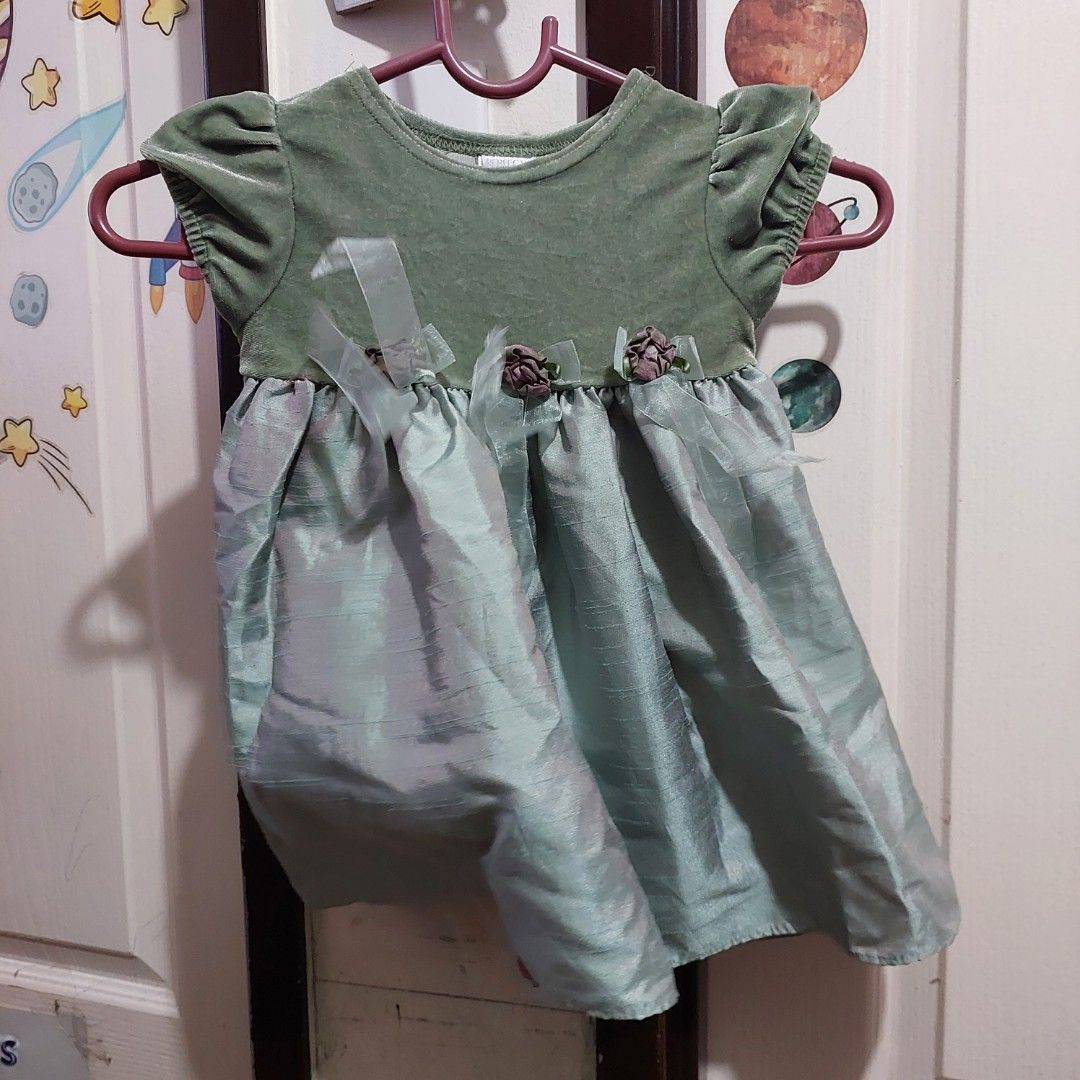 Green baby dress (Category: Babies & Kids Fashion) located in Manila. Submitted by thriftingiswise (Listing ID 1325584571, Image 1). Description: Used once in an occasion by my daughter when she was 18mos old. loc: manila mop: gcash shipping: grab/lala only.
