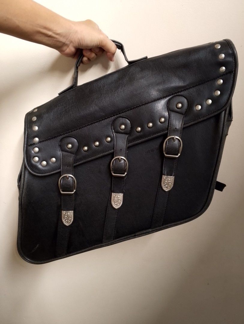 Half Motorcycle Saddle Bag Faux Leather (Category: Helmets and other Riding Gears) located in Binangonan. Submitted by stufflikedat (Listing ID 1325452888, Image 1). Description: Vintage motorcycle saddle bag (K+Division) for 1 side only (left or right side) was cut in the middle saddle (detachable) so it needs some DIY to use on your bike or just use as regular bag, some signs of usage but no tear or defect on the thick black faux leather materi