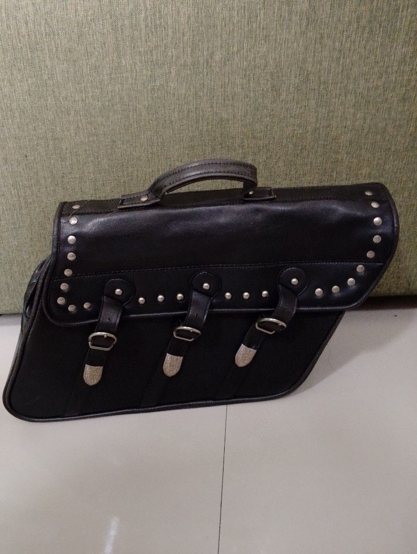 Half Motorcycle Saddle Bag Faux Leather (Category: Helmets and other Riding Gears) located in Binangonan. Submitted by stufflikedat (Listing ID 1325452888, Image 3). Description: Vintage motorcycle saddle bag (K+Division) for 1 side only (left or right side) was cut in the middle saddle (detachable) so it needs some DIY to use on your bike or just use as regular bag, some signs of usage but no tear or defect on the thick black faux leather materi