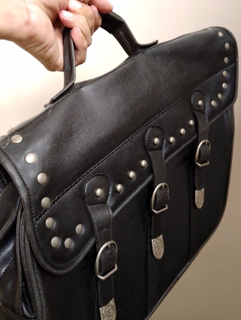 Half Motorcycle Saddle Bag Faux Leather (Category: Helmets and other Riding Gears) located in Binangonan. Submitted by stufflikedat (Listing ID 1325452888, Image 2). Description: Vintage motorcycle saddle bag (K+Division) for 1 side only (left or right side) was cut in the middle saddle (detachable) so it needs some DIY to use on your bike or just use as regular bag, some signs of usage but no tear or defect on the thick black faux leather materi