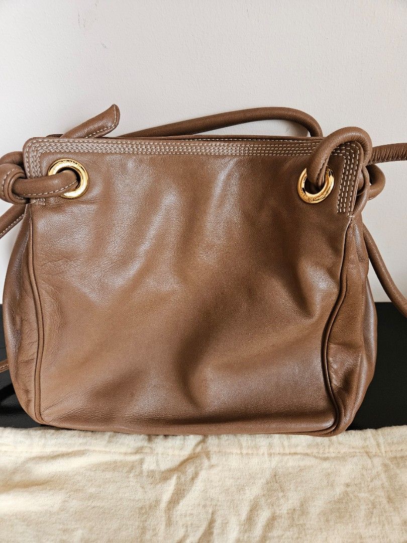 Loewe Handbag (Category: Luxury Bags & Wallets) located in Las Pinas. Submitted by bellaprima888 (Listing ID 1325498993, Image 2). Description: Selling well loved Loewe Bag bought in Madrid dustbag included 2 way shoulder bag still negotiable 3 compartments pls see last 2 photos for flaws Free Shipping.