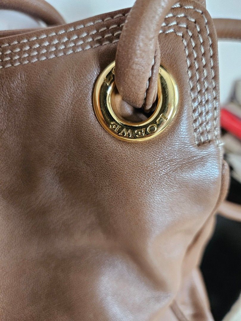 Loewe Handbag (Category: Luxury Bags & Wallets) located in Las Pinas. Submitted by bellaprima888 (Listing ID 1325498993, Image 3). Description: Selling well loved Loewe Bag bought in Madrid dustbag included 2 way shoulder bag still negotiable 3 compartments pls see last 2 photos for flaws Free Shipping.