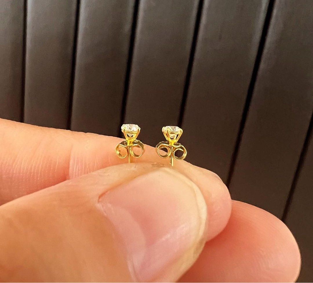 Mini Studs (Category: Earrings) located in Singapore. Submitted by chiemen (Listing ID 1325490389, Image 2). Description: 18k reall yellow gold MICRO Studs Pawnable Moissanite Stones 2nd hardest to diamonds Positive on diamond tester Clarity: FLAWLESS Color: D Selling per design and craftmanship, not per gram No box, no certificate, no receipts No return, no exchange once sold Seller won't be liable for any loss Buy only if comfortable For sure b