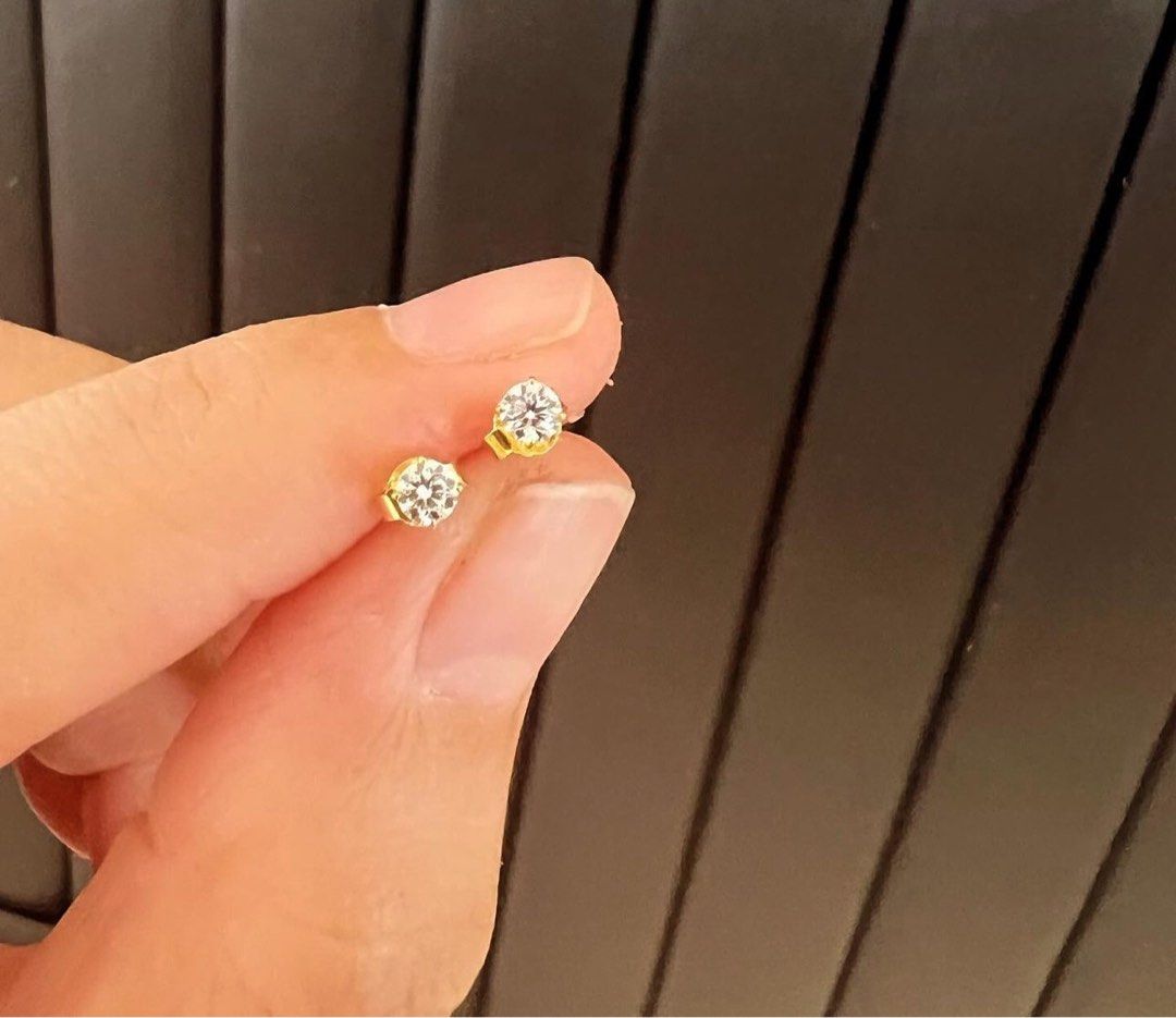 Mini Studs (Category: Earrings) located in Singapore. Submitted by chiemen (Listing ID 1325490389, Image 1). Description: 18k reall yellow gold MICRO Studs Pawnable Moissanite Stones 2nd hardest to diamonds Positive on diamond tester Clarity: FLAWLESS Color: D Selling per design and craftmanship, not per gram No box, no certificate, no receipts No return, no exchange once sold Seller won't be liable for any loss Buy only if comfortable For sure b