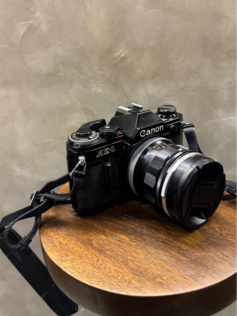 Canon AE-1 35mm (Category: Cameras) located in Makati City. Submitted by yukkini (Listing ID 1325717244, Image 2). Description: Canon AE-1 Film. Bought second hand. With lens cap. 35mm lens. Rfs: Decluttering.